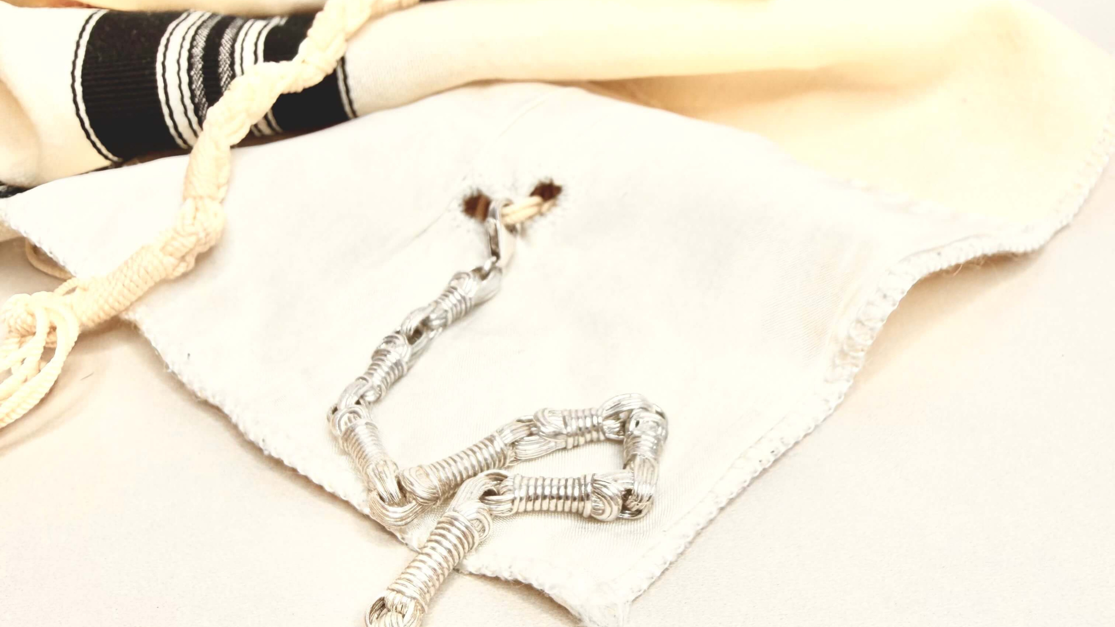 Tallisman I Necklace №2 · Sterling Silver from The Tallisman Collection attached to a Tallit Katan