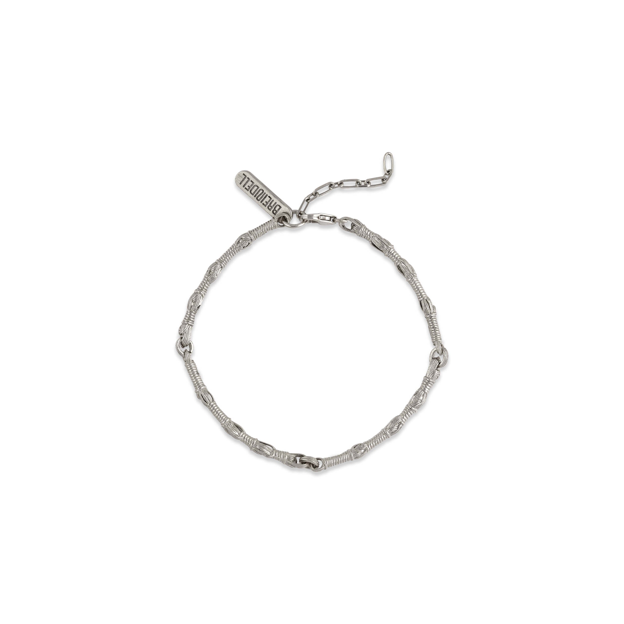 Flat lay of Tallisman I Bracelet №1 in Sterling Silver on white background with soft shadow — Ashkenazi Tzitzit-inspired Jewish jewelry and Judaica, handcrafted in Israel
