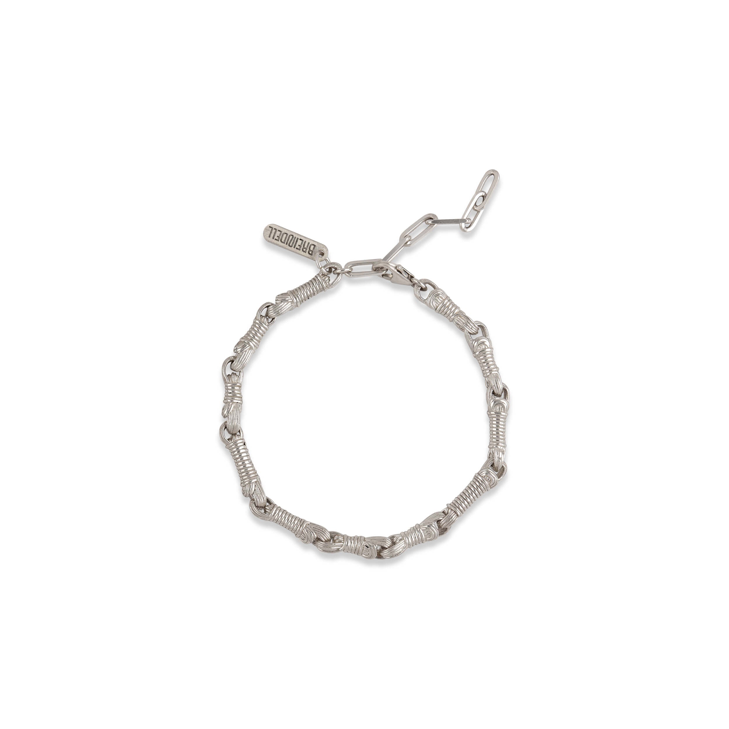 Flat lay of Tallisman I Bracelet №2 in Sterling Silver on white background with soft shadow — Ashkenazi Tzitzit-inspired Jewish jewelry and Judaica, handcrafted in Israel