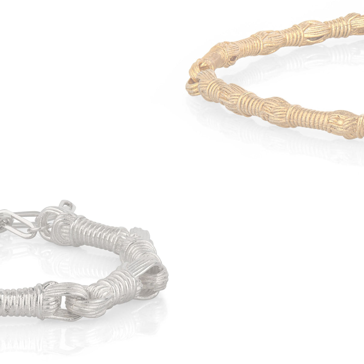 A silver tzitzit bracelet with intricate wound thread and knot details on the bottom left, and a gold tzitzit bracelet with matching knotted thread details on the top right, all against a white background.