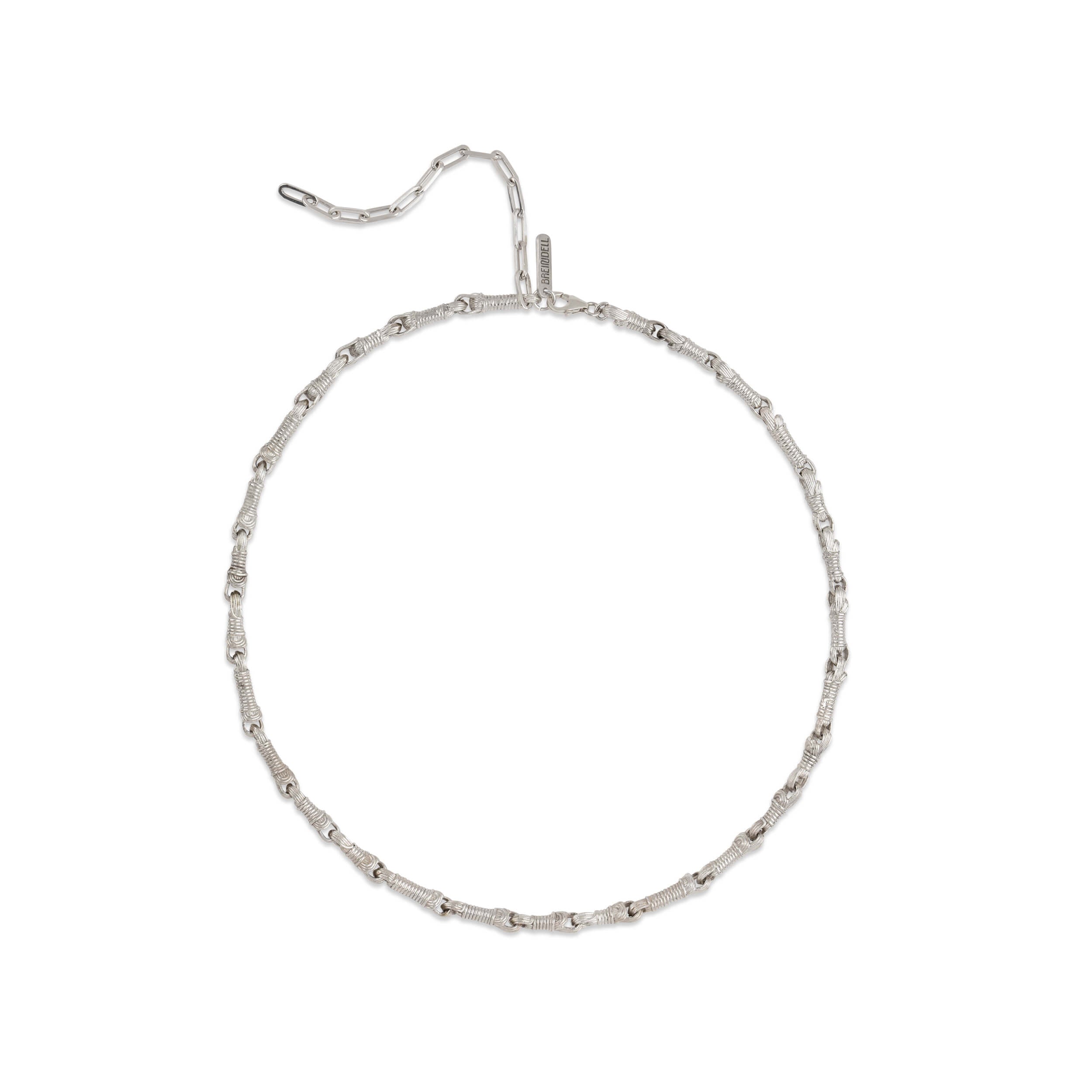 Flat lay of Tallisman I Necklace №2 in Sterling Silver on white background with soft shadow — Ashkenazi Tzitzit-inspired Jewish jewelry and Judaica, handcrafted in Israel